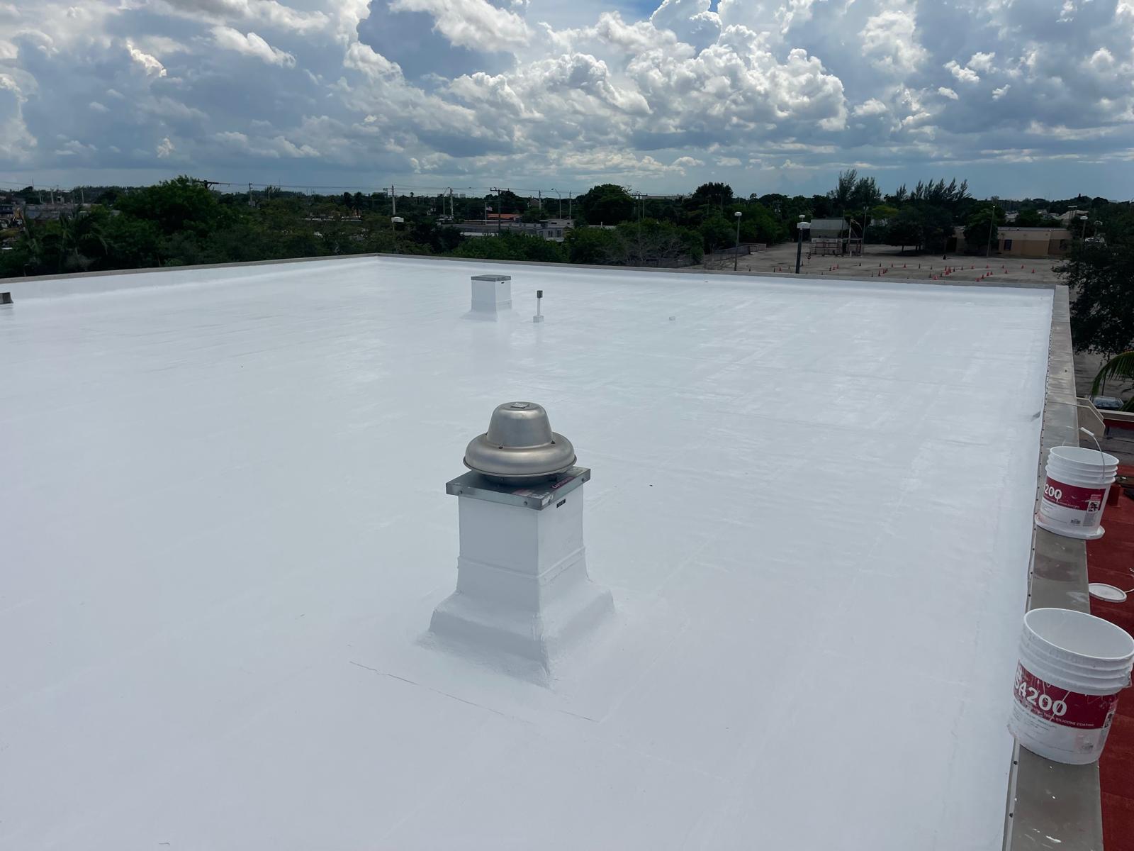 Completed reflective GacoFlex overlay on a refurbished commercial roof