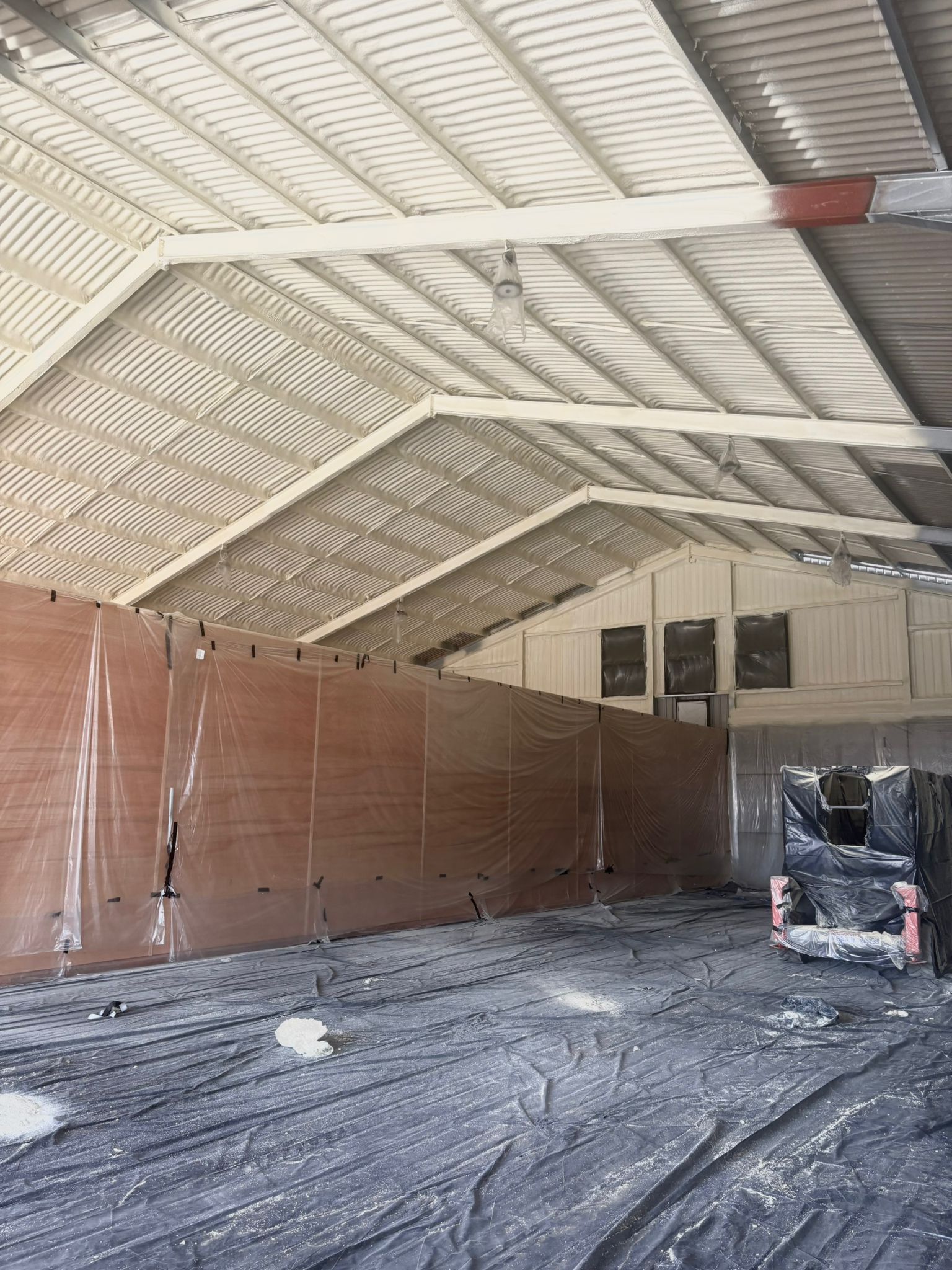 Agricultural building spray foam roof insulation — dairy and livestock