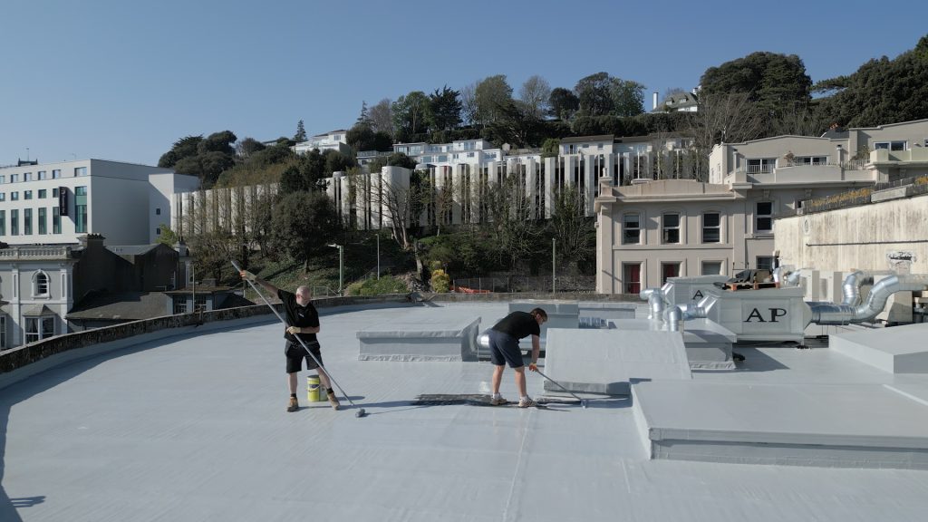 Torquay, England: S42 silicone worked by hand around rooflights and plant (UK project).