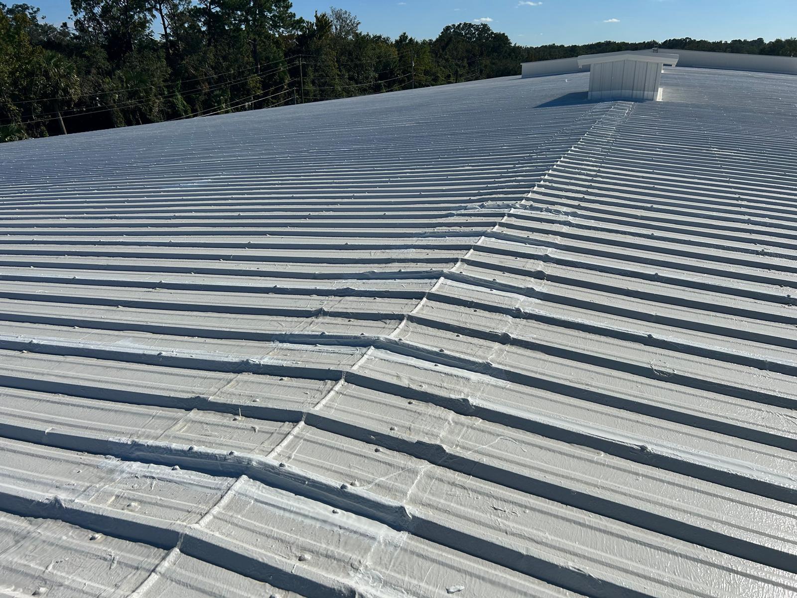 Profiled metal industrial roof repaired with GacoFlex coating