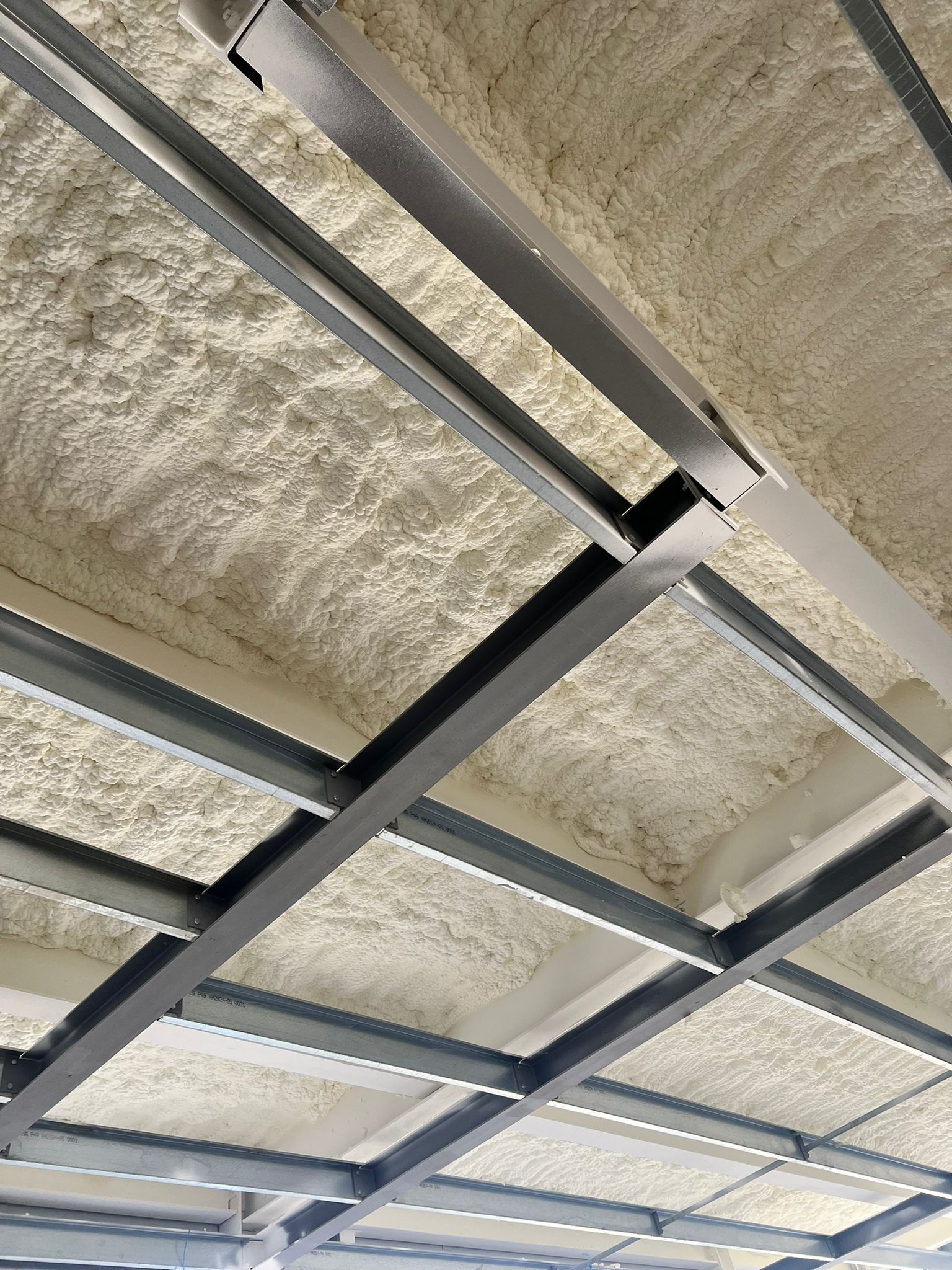 Completed steel deck car park soffit insulation with DC315 coating