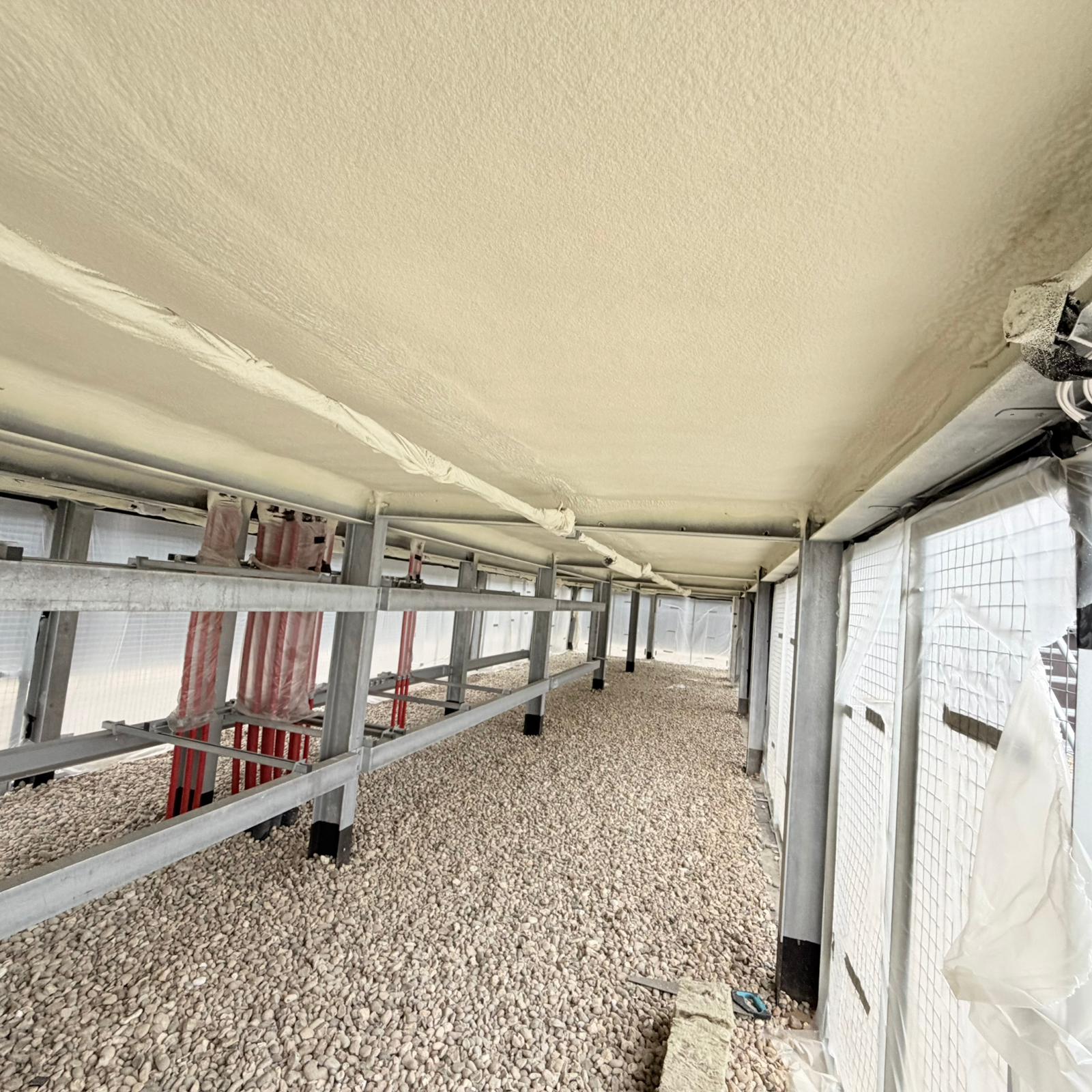 Commercial office building soffit insulation install
