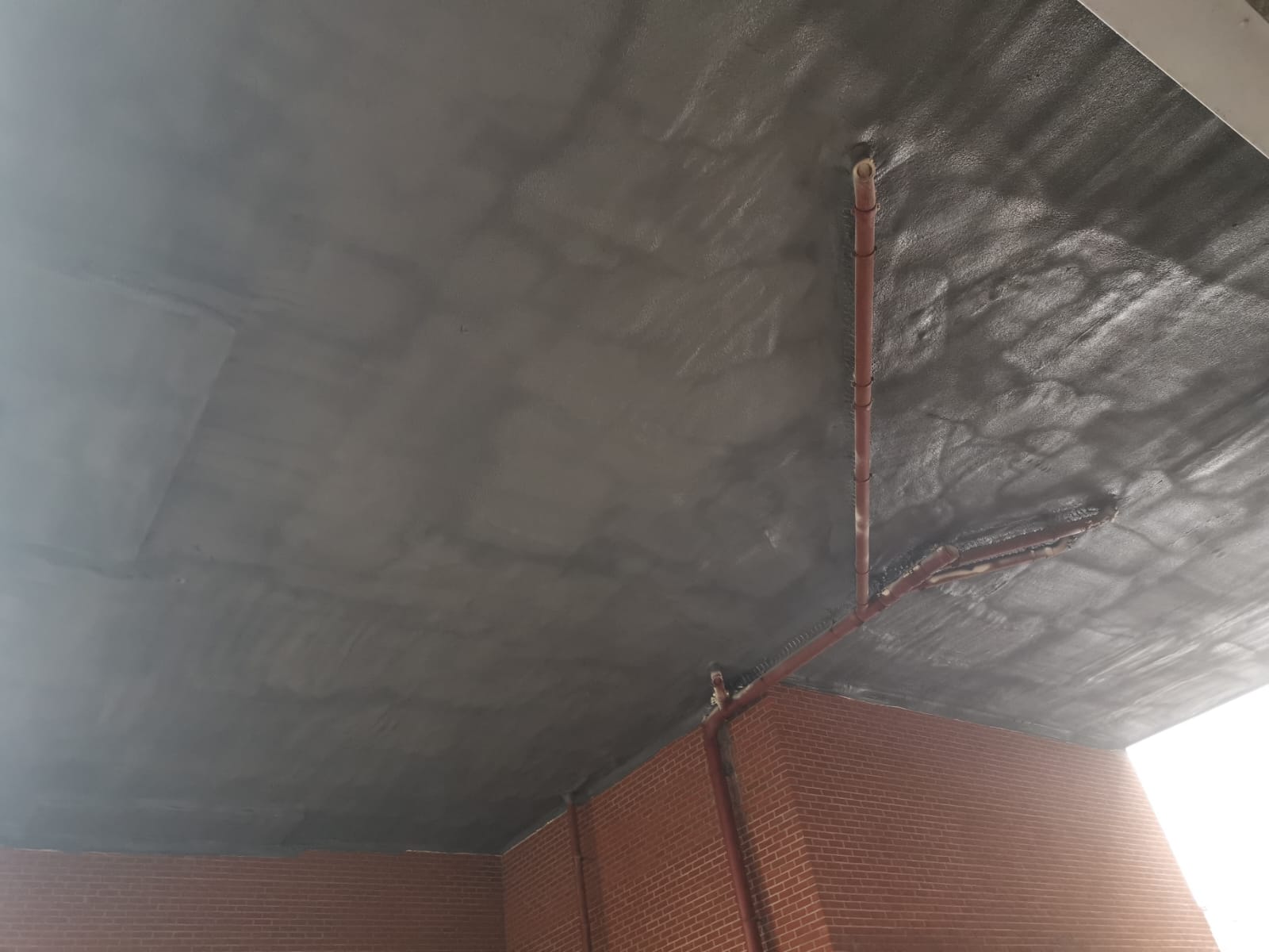 Euroclass B fire rated soffit insulation in a multi-storey car park in Bristol, England