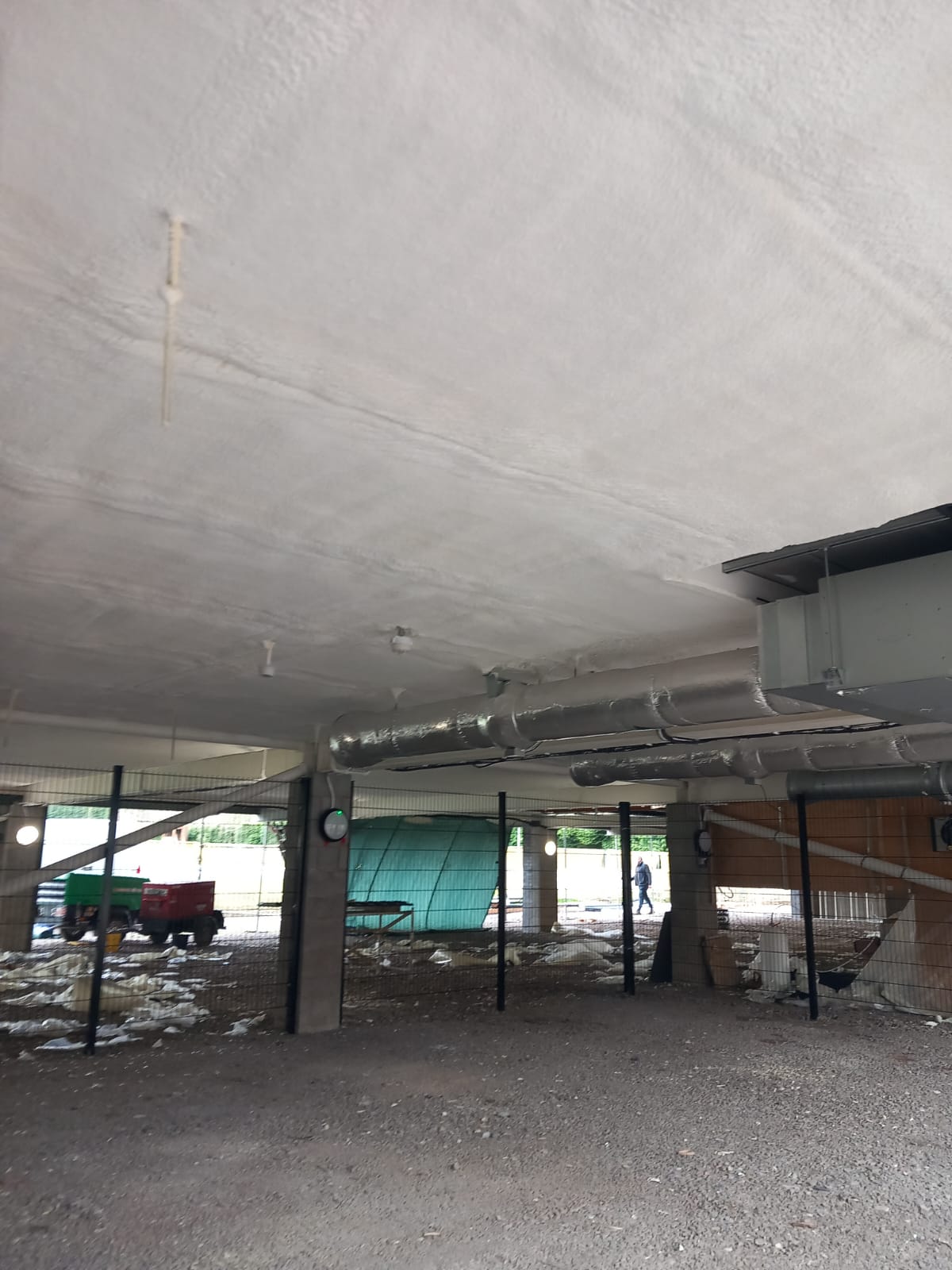 Enverge Nexseal LE closed-cell spray polyurethane foam being applied to a concrete car park soffit
