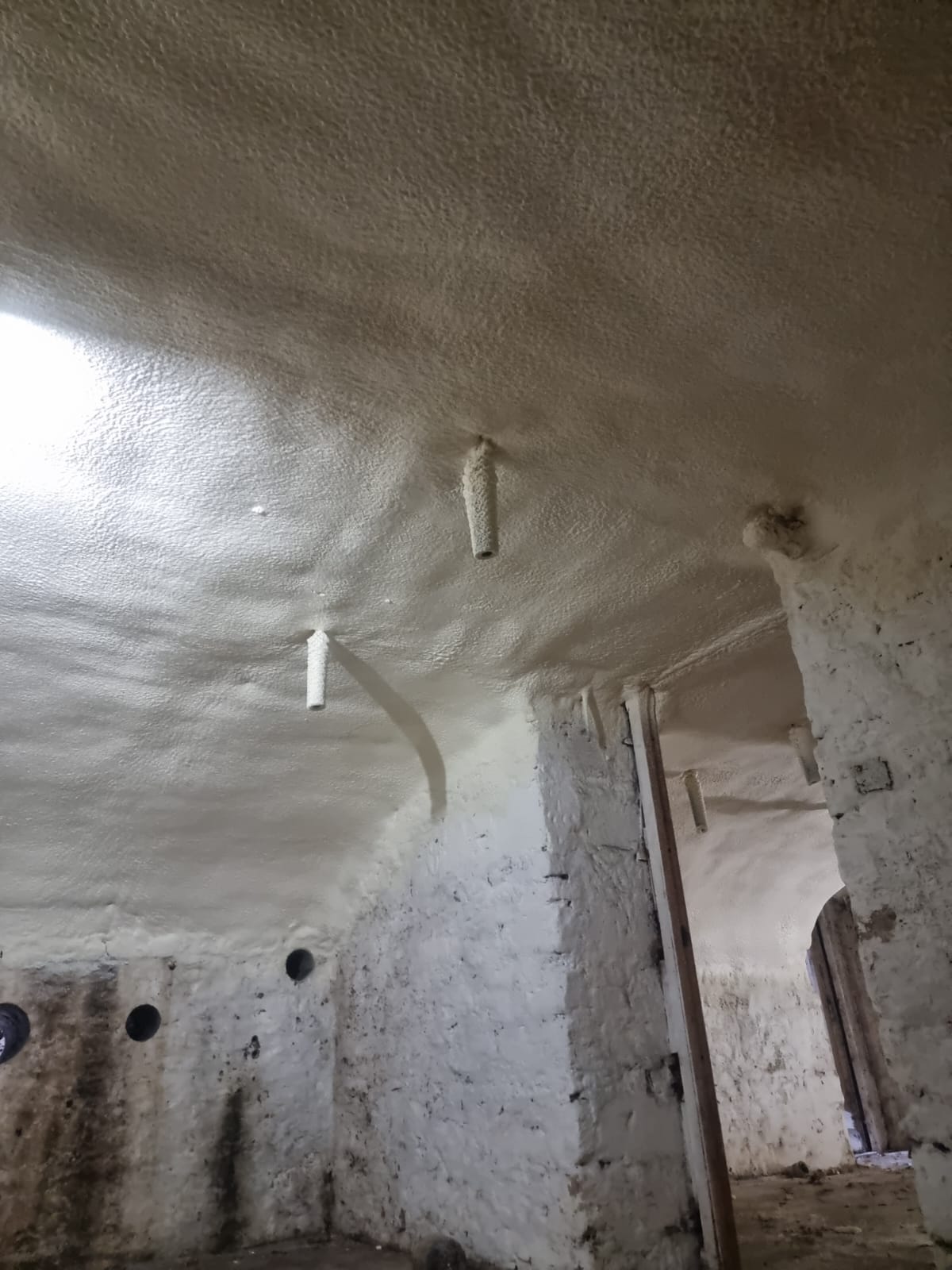Mezzanine deck soffit underside with Nexseal LE closed-cell foam applied