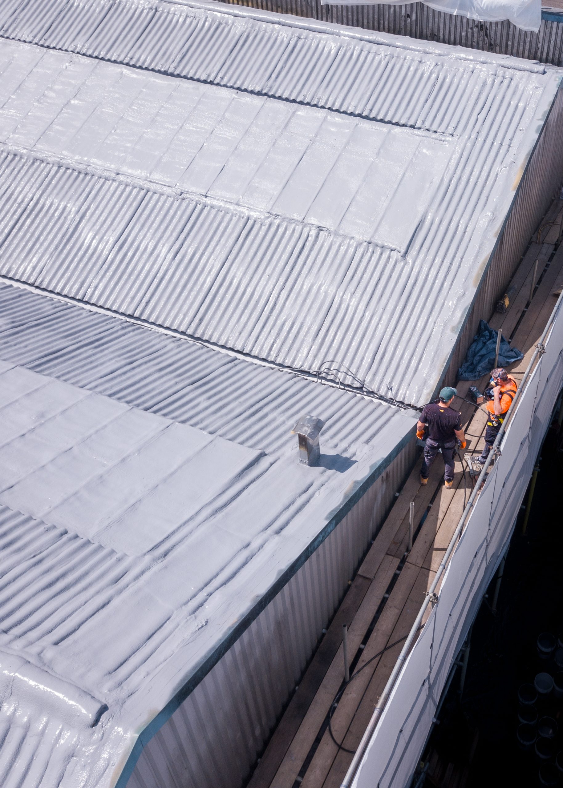 GacoFlex silicone applied over an asbestos cement roof