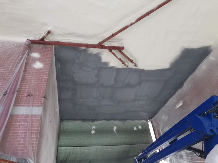 Soffits and podium decks insulated with Purios spray foam