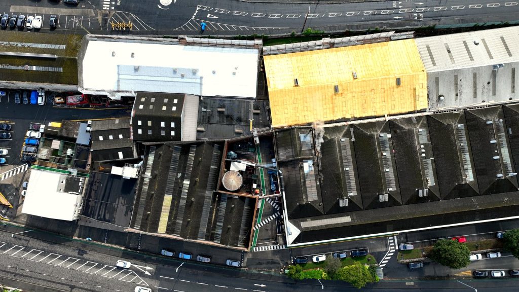 Aerial overview of the SAICA plant at Warrenpoint, County Down, showing treated and untreated roofs.